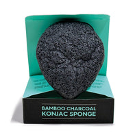 Bamboo charcoal konjac sponge in a teal and black box on a white background